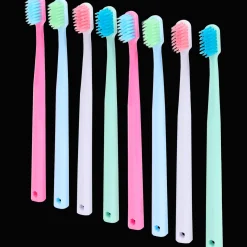 Action Brosses à dents OptiSmile* Soins Buccaux